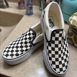 Vans Women’s Black and White Checkered Slip-On Sneakers